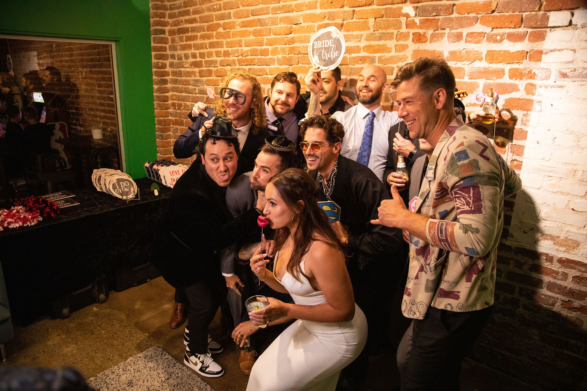 MG Studio Wedding Event Space Downtown Los Angeles Renovated Warehouse Exposed Brick Wood Beams Concrete Modern Industrial Chic - Group Friends Photobooth