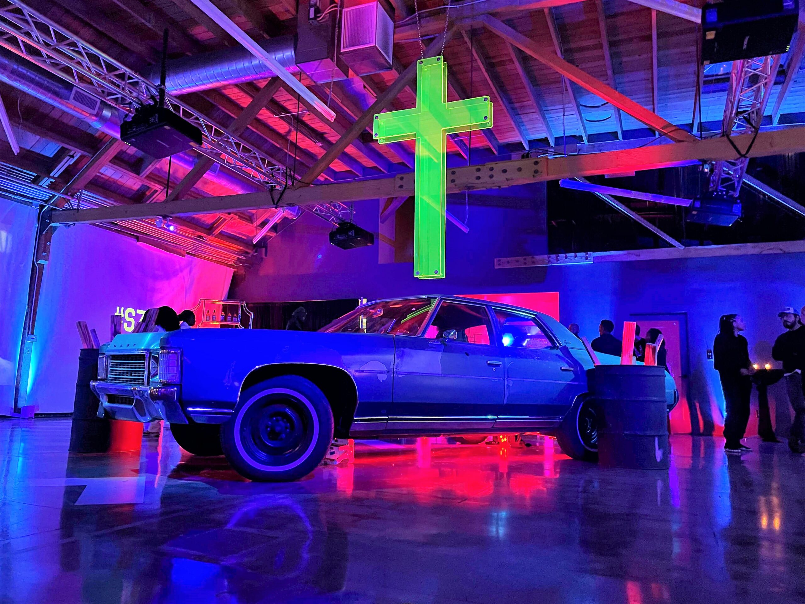 MG Studio SZA Album Release Party Car Neon Cross